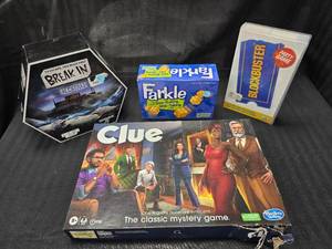 lot 219 image: Assorted Games, Blockbuster Party Game, Farkle, Break In, Clue