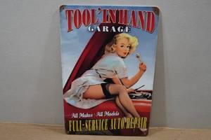 lot 111 image: Novelty Metal Sign - Tool In Hand Garage