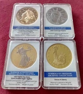 lot 13 image: (4) Reproduction Coins