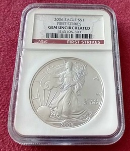 lot 23 image: 2006 1 oz Silver Eagle - NGC Gem Uncirculated