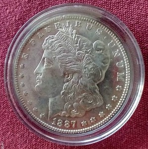 lot 27 image: Nice 1887 Morgan Dollar