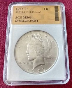 lot 50 image: 1923 Peace Dollar - SGS MS66