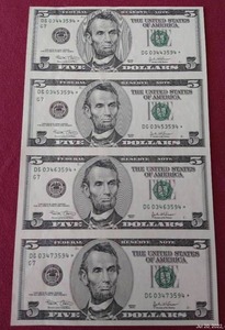 lot 54 image: Uncut Strip of (4) 2003 $5 Star Notes - Very Cool