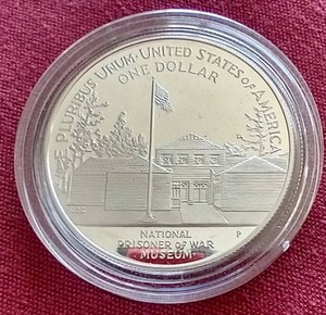 lot 114 image: 1994-W P.O.W. Commemorative Silver Dollar