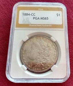 lot 126 image: 1884-CC Morgan Dollar - PGA MS65