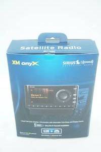 lot 7 image: Sirius XM Onyx Satellite Radio wvehicle kit. (Model XDNX1V1)