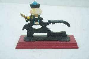 lot 94 image: Vintage Cast Iron and Wood Soldier Nutcracker