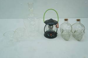 lot 165 image: Clear Glass Skull Decanter and Clear Glass Skulls 2ct wcorks, 2 clear glass skull shot glasses