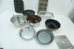 lot 179 image: Bundt Pans, Angel Food Cake Pans, Pie Plates, Strainer Basket, donut pan, muffin pan