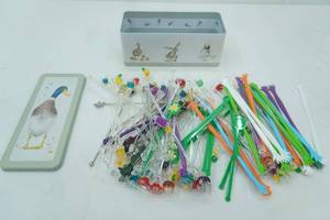 lot 265 image: Glass Stir Sticks and Duck Themed Tin