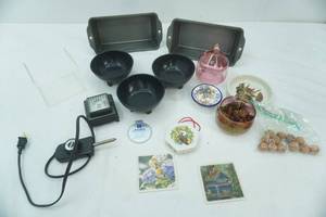 lot 297 image: Vintage Ashtrays, Princess House Heritage Cranberry Etched Glass Candy Dish wa Lid, Bread Pans and more