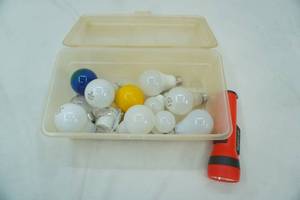 lot 299 image: Magnetic Flashlight, Variety of Light Bulbs and Sterilite Storage Container wlid