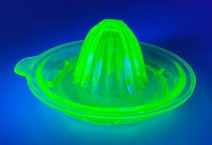 lot 14 image: 1940s Green Uranium Glass JuicerReamer (Chips Present)