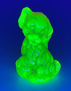lot 36 image: 1920s BOYD RARE Glass Amber Colored Uranium Glass Dog (Skippy) With Ball (Has Crack Within 3 14 (GLOWS)