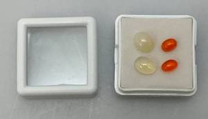 lot 123 image: Four 4 x 6 MM Natural Ethiopian Oval Fire Opals & 6 x 8 MM Natural Ethiopian Opals