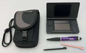 lot 138 image: Vintage Nintendo DS Lite Complete With Charger, Pen And Carrying Case (WORKS)