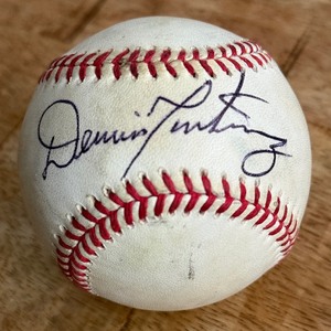 lot 76 image: Dennis Martinez Signed Baseball Rawlings OALB Brown Ball