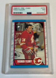 lot 61B image: Theo Fleury RC PSA 7 NM 1989 OPC #232 Rookie Hockey Card