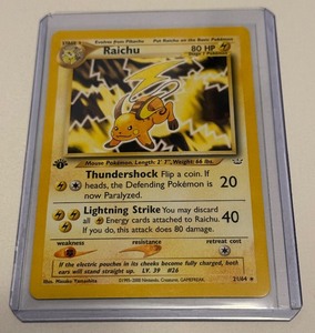 lot 118B image: Raichu 1st Edition Pokemon Card 2164