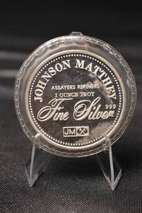 lot 5 image: Johnson Matthey 1 oz .999 Fine Silver Round & Alaska 25 Years Commemorative Silver Round