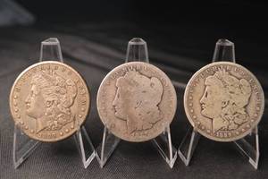 lot 31 image: Morgan Silver Dollars - 3 Coins 1889-O, 1897-O, 1887-O