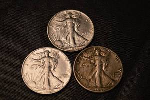 lot 37 image: Walking Liberty Half Dollars - 3 Coins - 1942, 1943, 1952 Silver U.S. Coin Lot