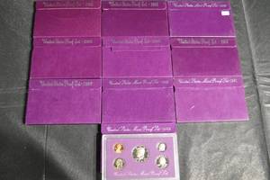 lot 103 image: United States Mint Proof Sets - Lot of 10 Purple Boxes (1984-1993)