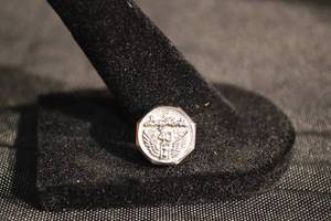 lot 117 image: 18K Gold Daytons40-Year Lapel Pin with 3 Small Diamonds 2.03g