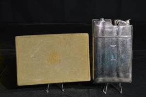 lot 132 image: Evans U.S. Patent Ribbed Silver Lighter with Original Box