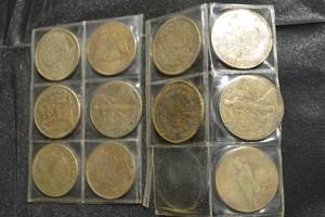 lot 143 image: Replica Coins - 11 Coins in Clear Plastic Binder Pages