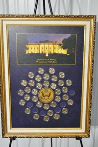 lot 287 image: Presidential Dollars Display Frame with Assorted U.S. Presidential Coins