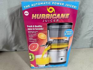 lot 153 image: New Cordless Rechargeable Hurricane Electric Juicer