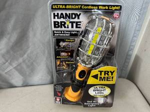 lot 155 image: New Handy Brite Cordless LED Worklight