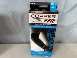 lot 215 image: New Copper Fit Compression Elbow Sleeve - Medium