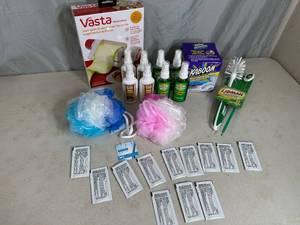 lot 295 image: New Cleaning Supplies, Sponges, Brushes, First Aid, Vasta Slicers, and More