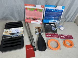 lot 47 image: Assorted New Kitchen Accessories, Drain Board, Ice Trays, Reusable Bags, Etc.