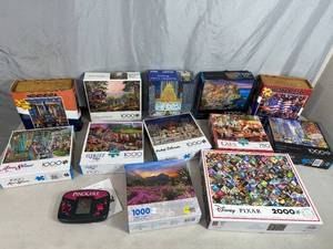 lot 69 image: Assorted Puzzles, Digital Pinochle Game