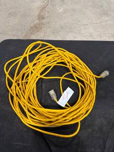 lot 1551 image: Yellow 100ft 14AWG Extension Cord