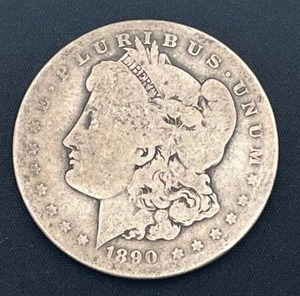 lot 20 image: 1890-O Morgan Silver Dollar