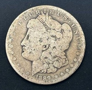 lot 44 image: 1889-O Morgan Silver Dollar