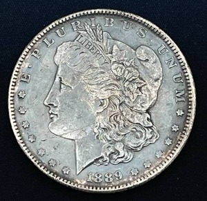 lot 61 image: 1889 Morgan Silver Dollar