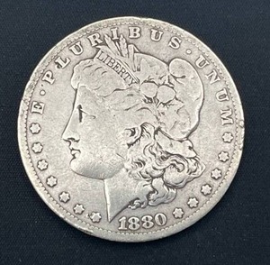 lot 84 image: 1880-O Morgan Silver Dollar