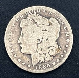 lot 89 image: 1886-O Morgan Silver Dollar