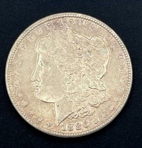 lot 105 image: 1886 Morgan Silver Dollar