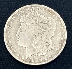 lot 108 image: 1886-O Morgan Silver Dollar