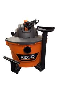lot 1 image: The RIDGID 9 Gallon WetDry Vacuum has a 4.25 Peak HP motor and comes with a General Debris Filter, locking hose, and attachments for efficient cleaning.