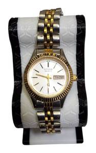 lot 62 image: Citizen Ladies Quartz Watch with Two-Tone Stainless Steel and Gold Plating, featuring a Day-Date Display.