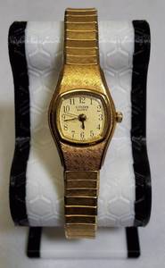 lot 60 image: Citizen ladies quartz watch from the 1980s, featuring a gold-tone finish and a stretchy band