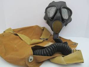 lot 87 image: Original 1942 Gas Mask wOriginal Canvas Bag &amp Chemical Smoke Canister - Davis Emergency Equipment Co.