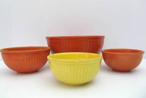 lot 104 image: Group of Vintage Orange &amp Yellow Stoneware Mixing Bowls